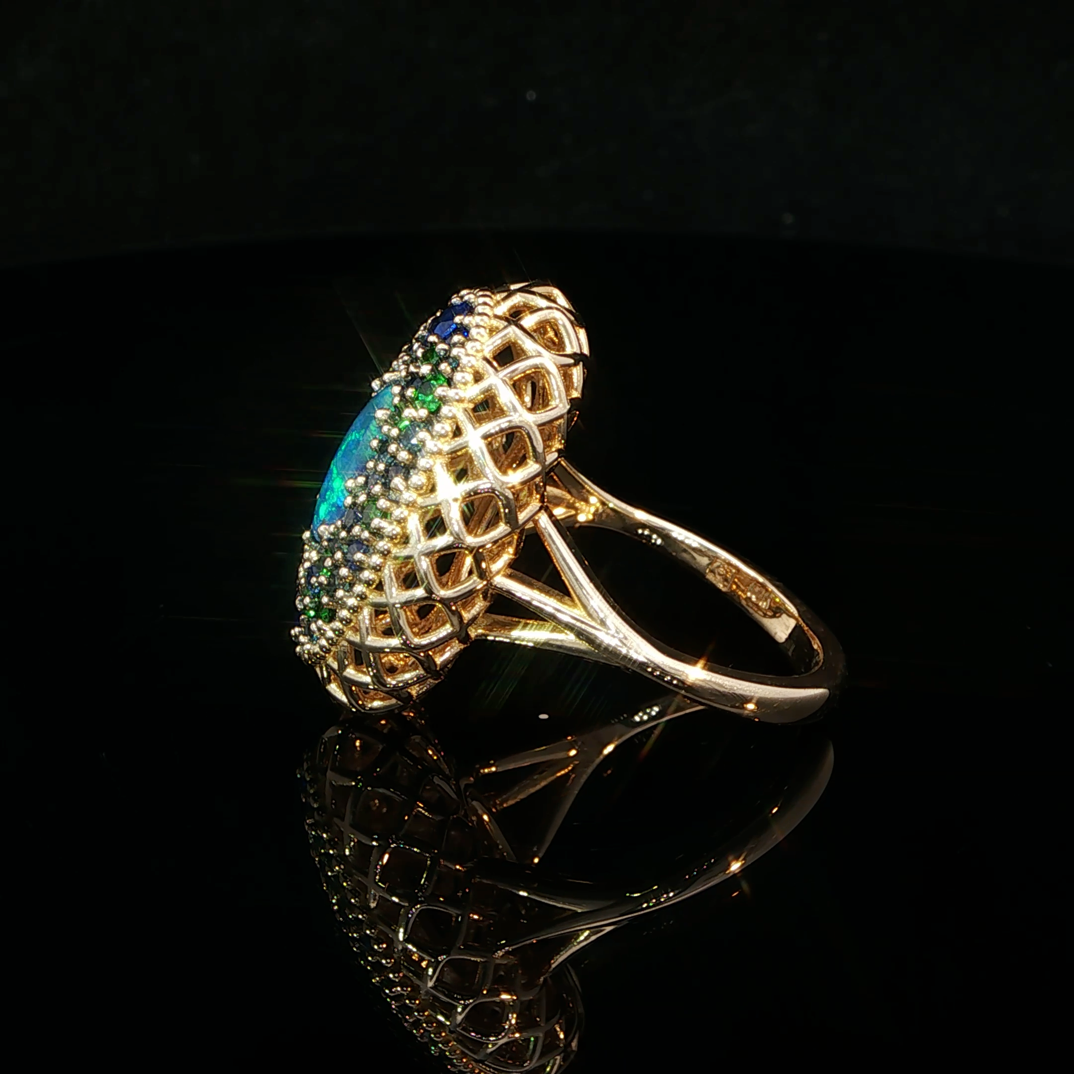 BLACK LIGHTNING RIDGE OPAL, SAPPHIRE AND TSAVORITE GARNET RING