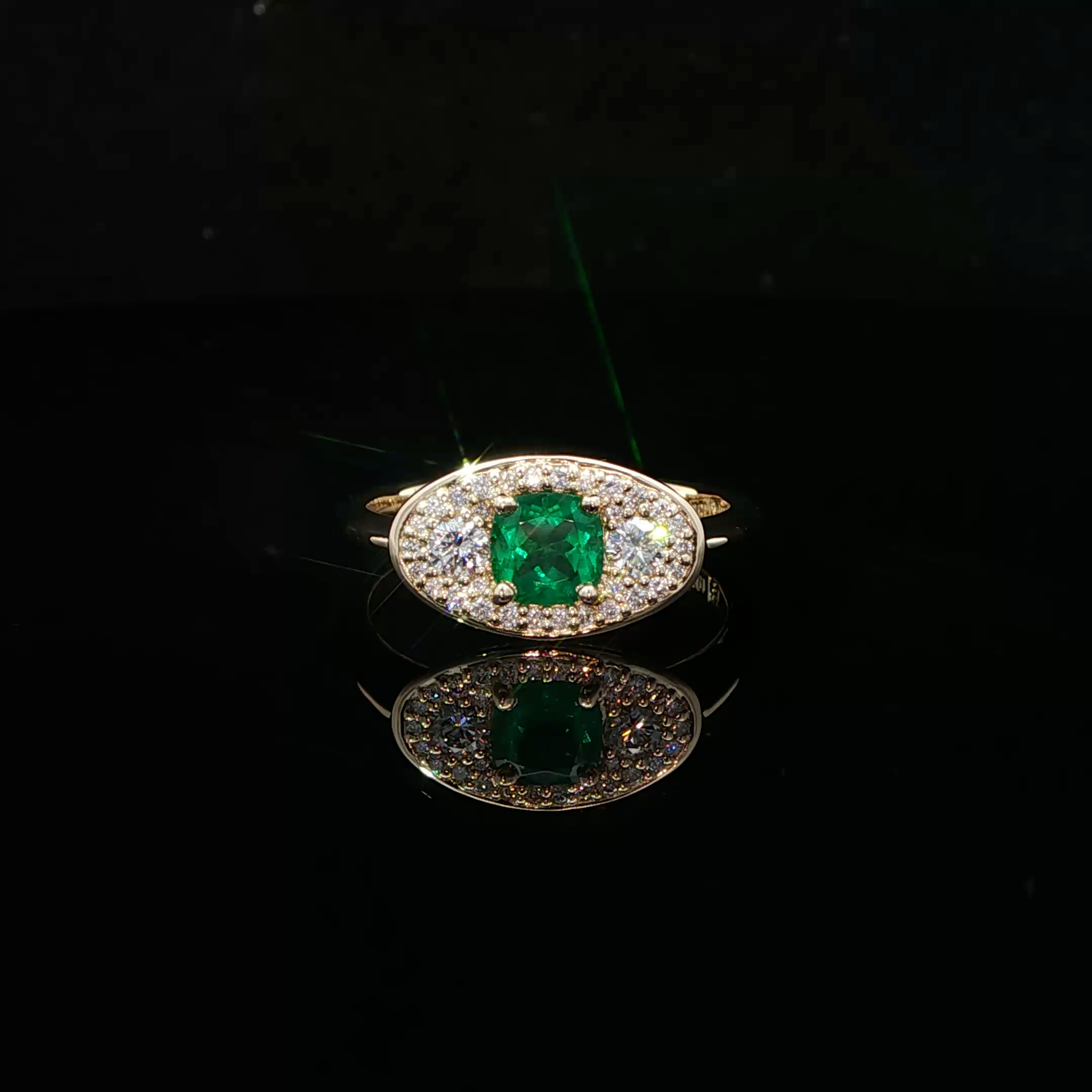 CUSHION EMERALD AND DIAMOND RING